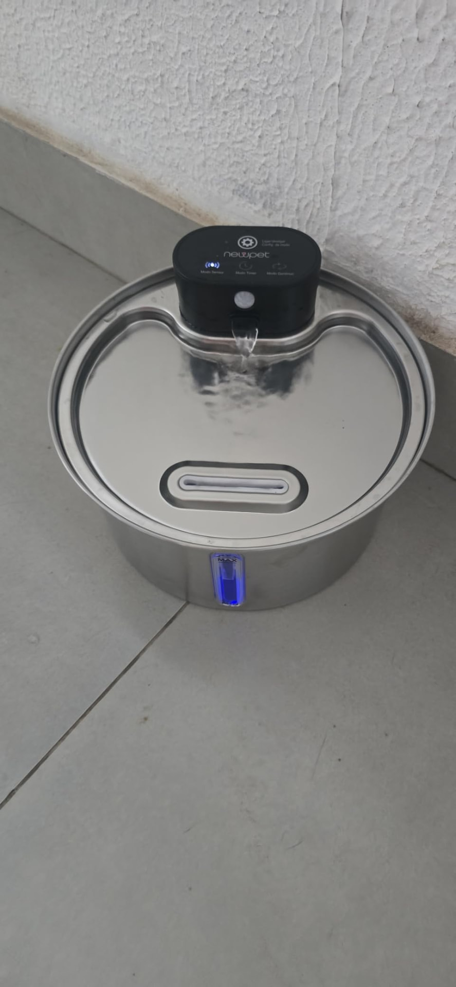 Foto enviada por cliente da fonte de água em uso