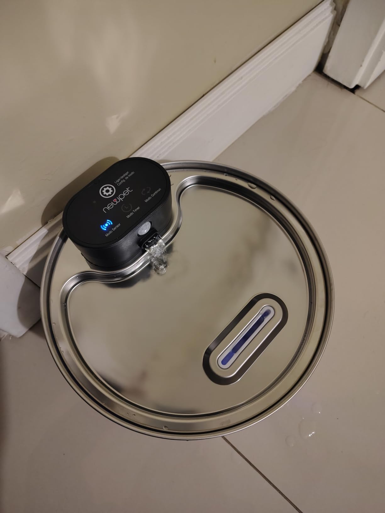 Foto enviada por cliente da fonte de água em uso
