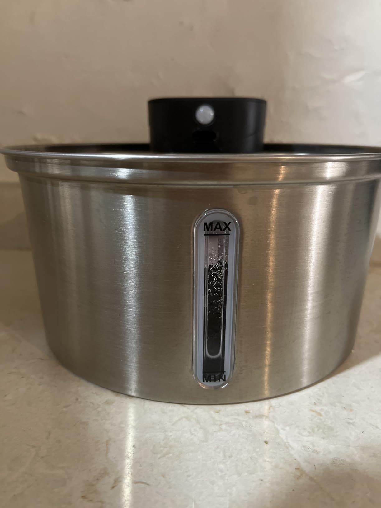 Foto enviada por cliente da fonte de água em uso