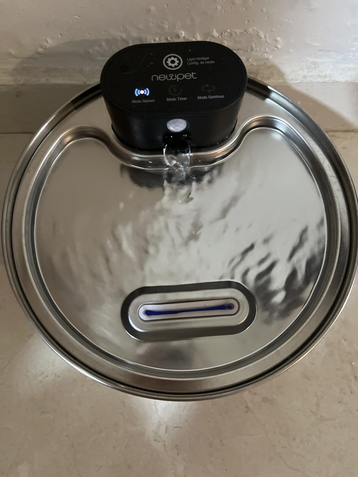 Foto enviada por cliente da fonte de água em uso